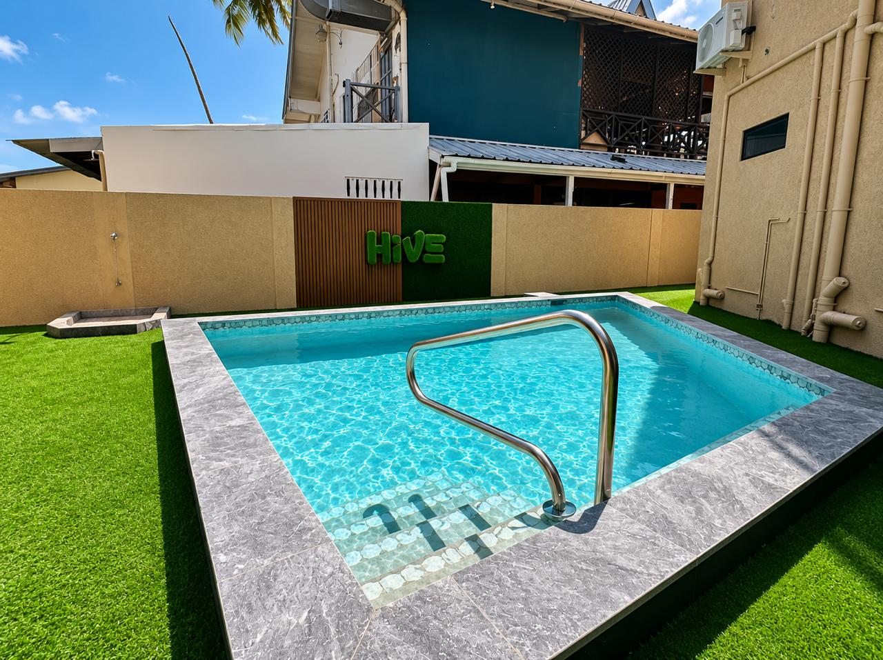 Pool and lawn at The Hive Crown Point townhouses